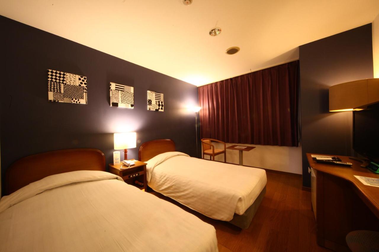 Hotel Naturwald Furano Bagian luar foto